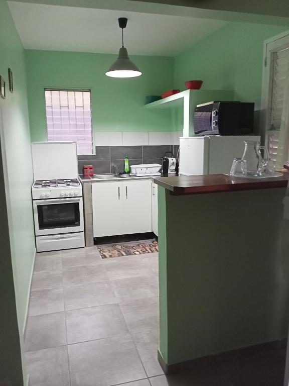 Kuchyň nebo kuchyňský kout v ubytování Paradis Caché - Confort Terrasse - Kybo Karaib Location - pkg - Mtgne