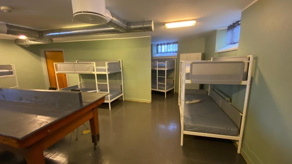 Postel nebo postele na pokoji v ubytování Sjømannskirken Narvik