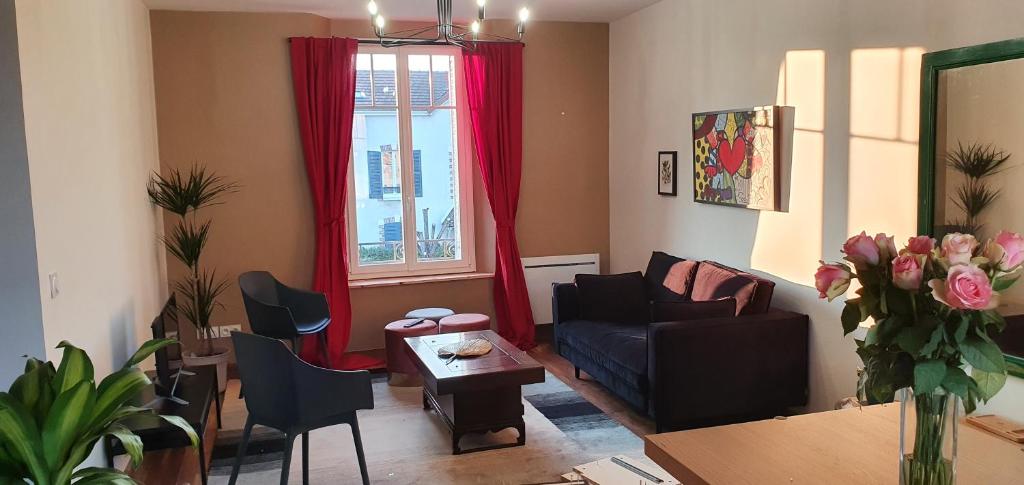 Posezení v ubytování Appartements CDG JOIGNY
