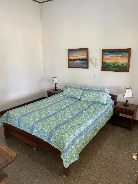 Postel nebo postele na pokoji v ubytování Hotel Del Aserradero