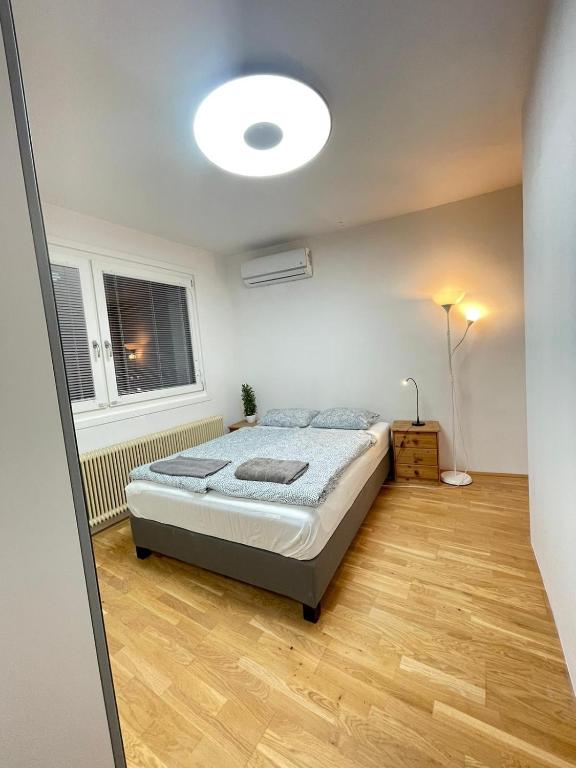 a bedroom with a bed in a room at Nice rooftop hostel in Vienna