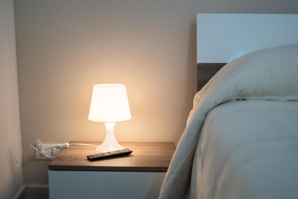A bed or beds in a room at Al Corso 213