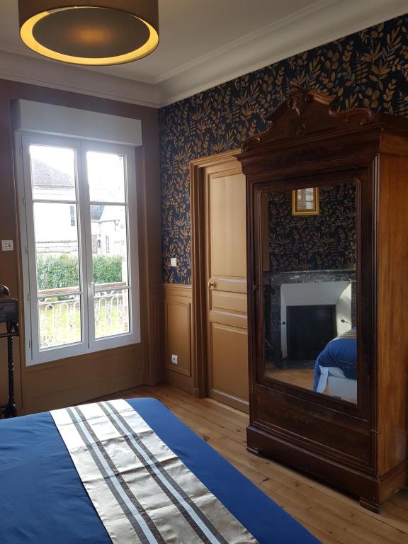 Posteľ alebo postele v izbe v ubytovaní Le Clos Saint-Germain