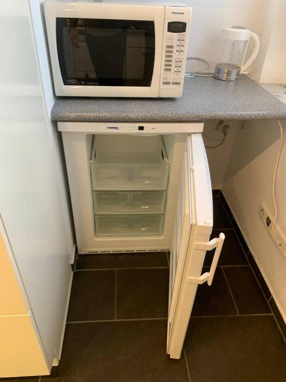Kuchyň nebo kuchyňský kout v ubytování Mainpark Apartment 4 Schlafzimmer bis zu 10 Personen direkt über AschaffApartment bei Aschaffenburg