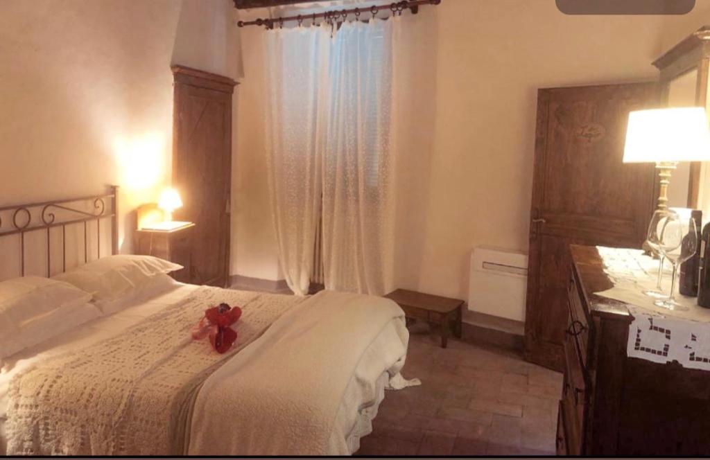 Postel nebo postele na pokoji v ubytování Guesthouse da Idolina dal 1946