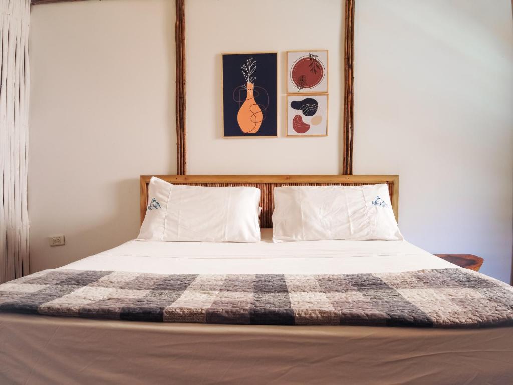 Postel nebo postele na pokoji v ubytování NENA BEACH CLUB & HOTEL