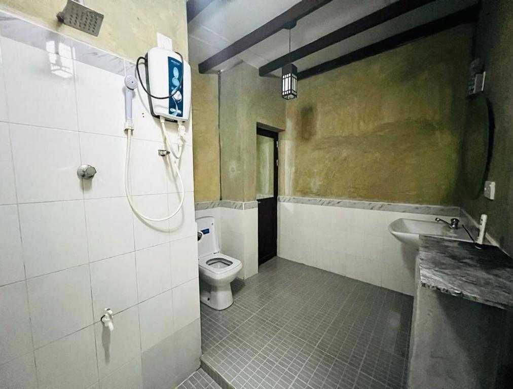 Koupelna v ubytování Krishan Villa