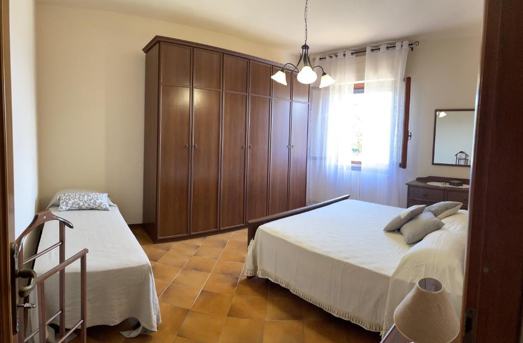 A bed or beds in a room at Casa Dani