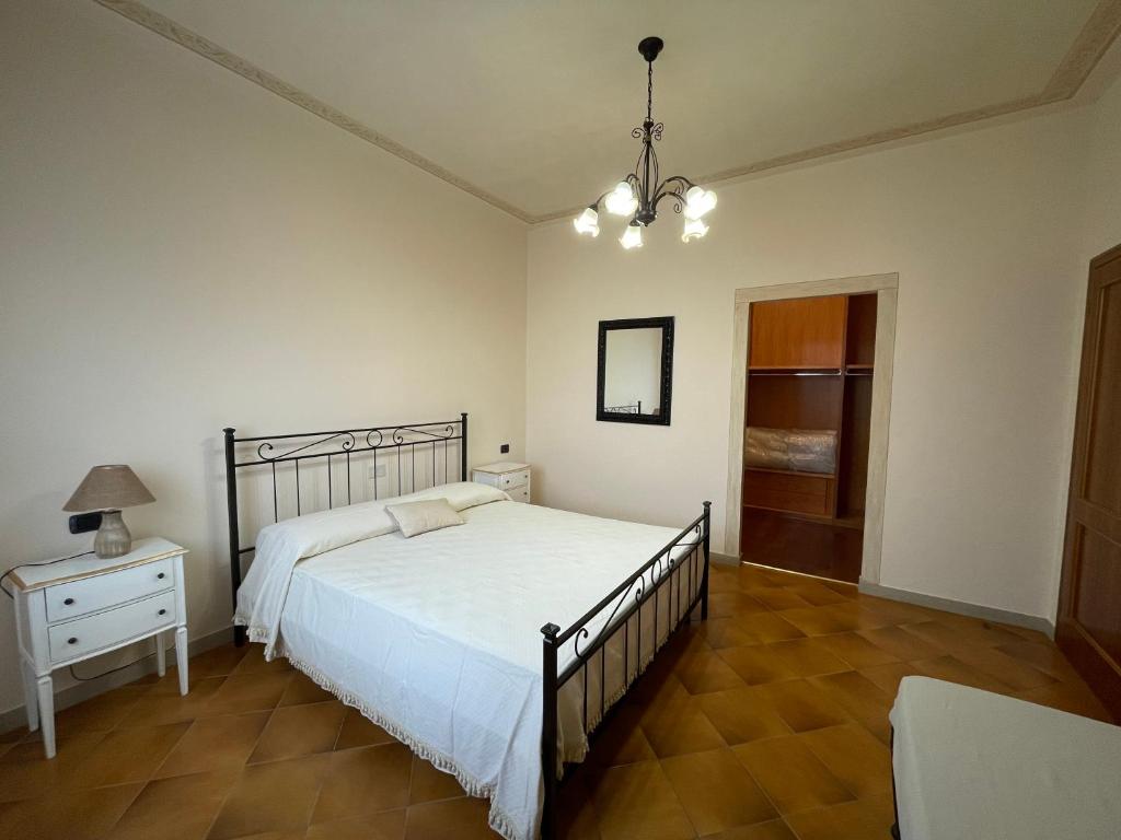 A bed or beds in a room at Casa Dani