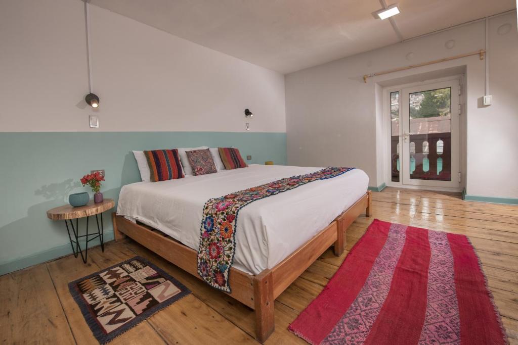 Postel nebo postele na pokoji v ubytování Inkarri Cusco