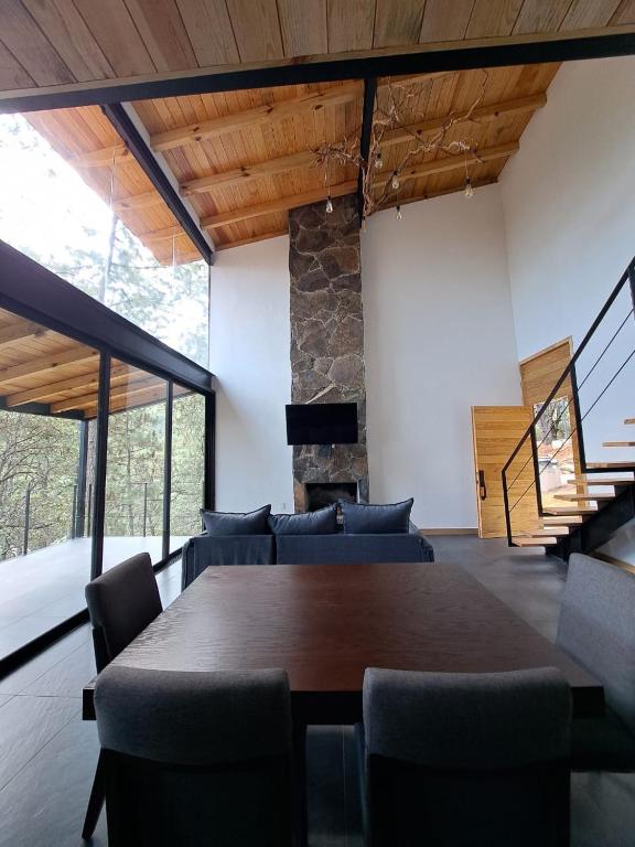 Posezení v ubytování Cabaña La Finca Mazamitla