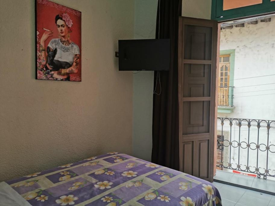 Postel nebo postele na pokoji v ubytování HOTEL LIMÓN