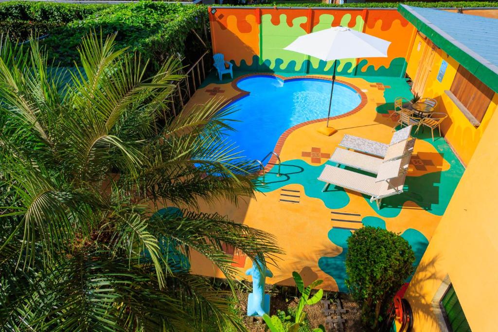 Bazén v ubytování Hotel Boutique La Casa de las Flores nebo v jeho okolí