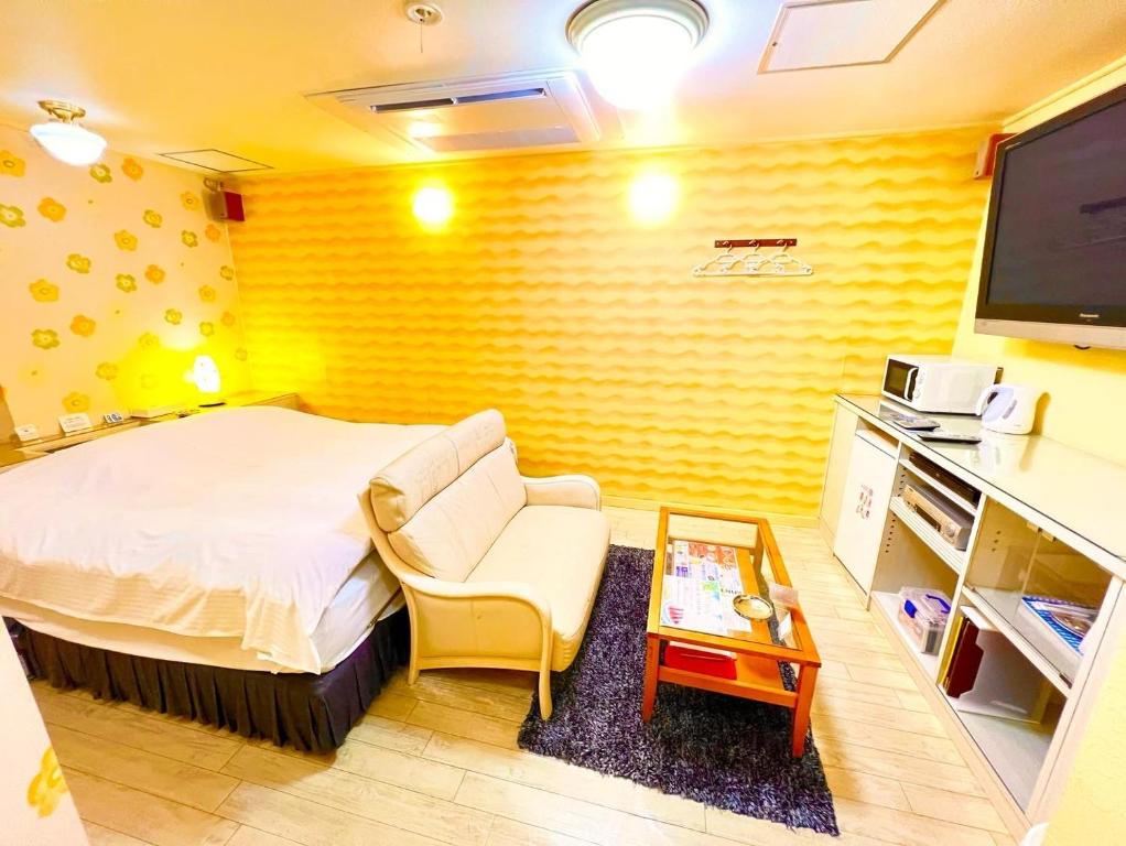Łóżko lub łóżka w pokoju w obiekcie HOTEL MINT HOUSE -resort and relaxation-