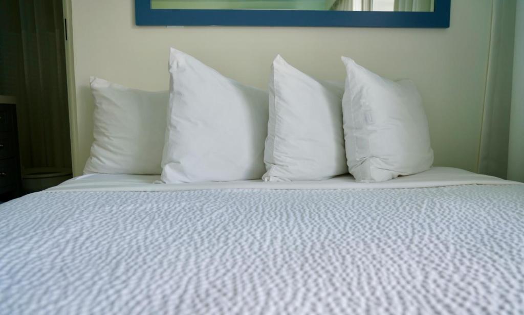 Postel nebo postele na pokoji v ubytování Hotel La Croix