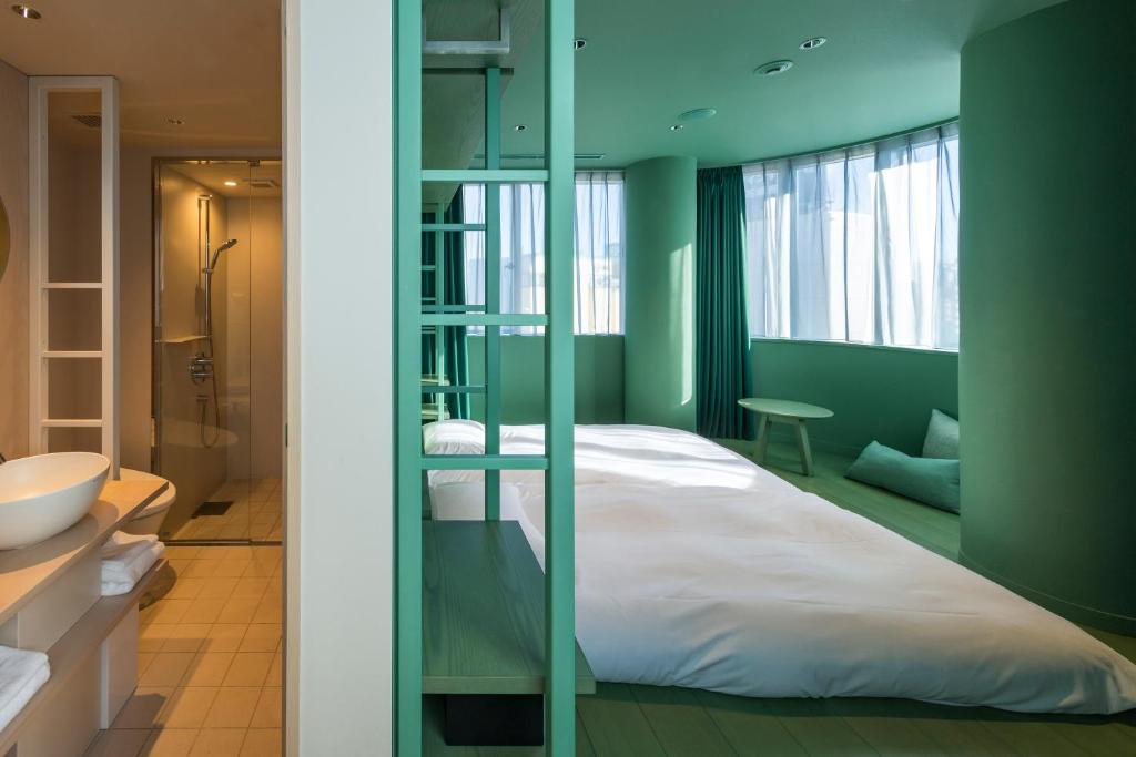 Postel nebo postele na pokoji v ubytování toggle hotel suidobashi TOKYO