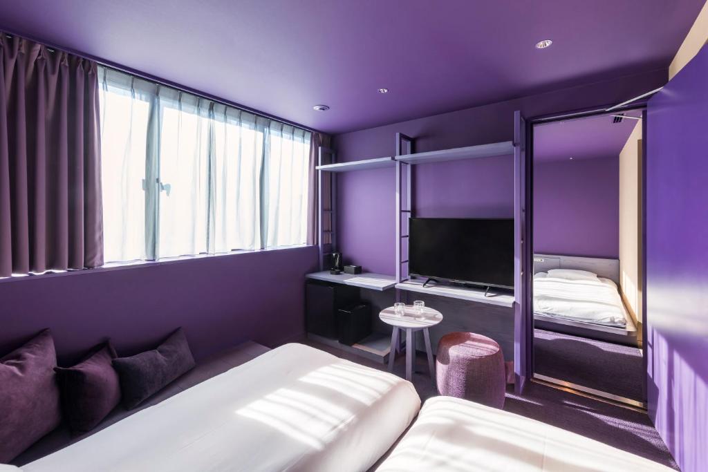 Postel nebo postele na pokoji v ubytování toggle hotel suidobashi TOKYO