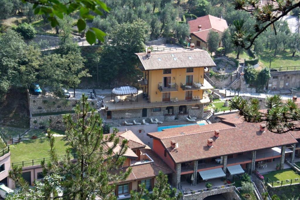 an aerial view of a house with a pool at Villa Seriola in Limone sul Garda