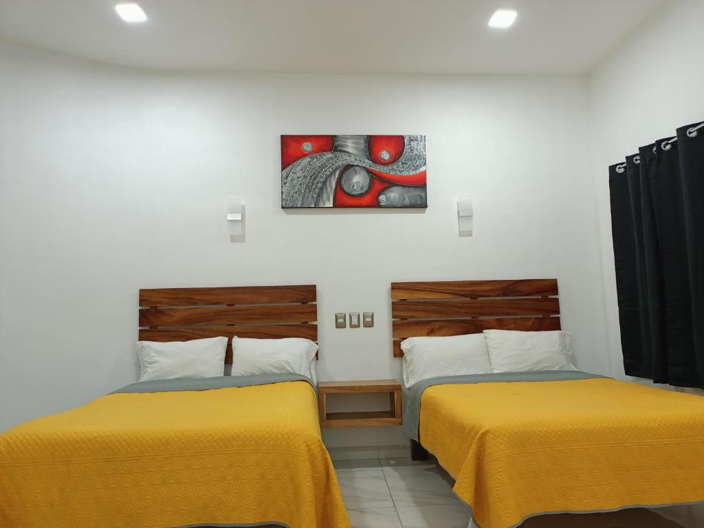 Ένα ή περισσότερα κρεβάτια σε δωμάτιο στο DEPARTAMENTOS LIZDIAN