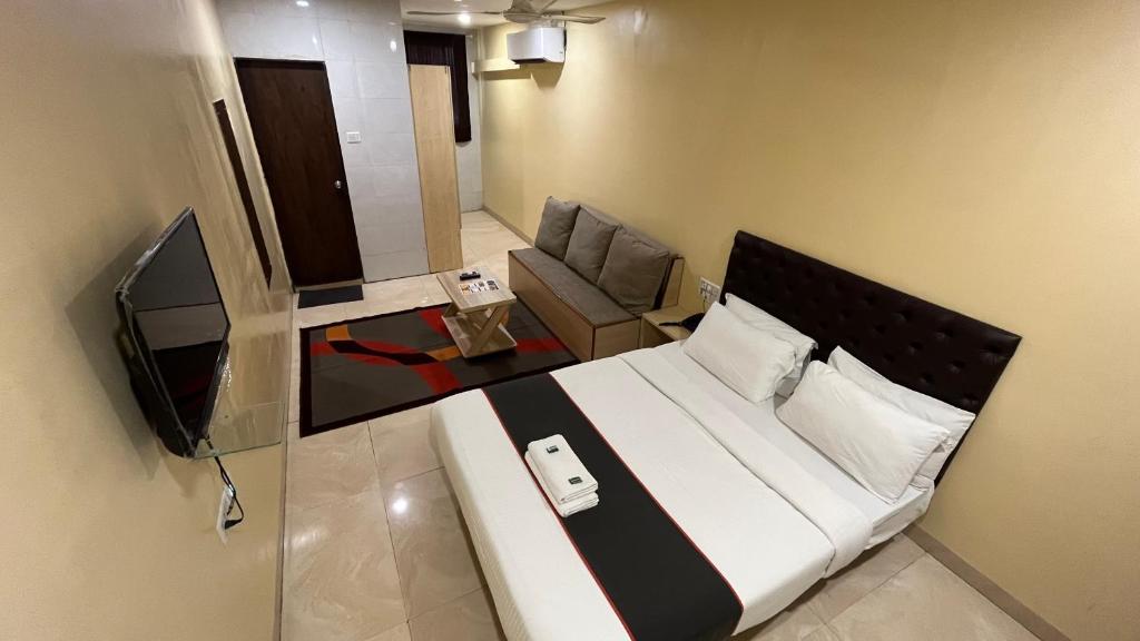 Una cama o camas en una habitación de U LIFE HOTEL