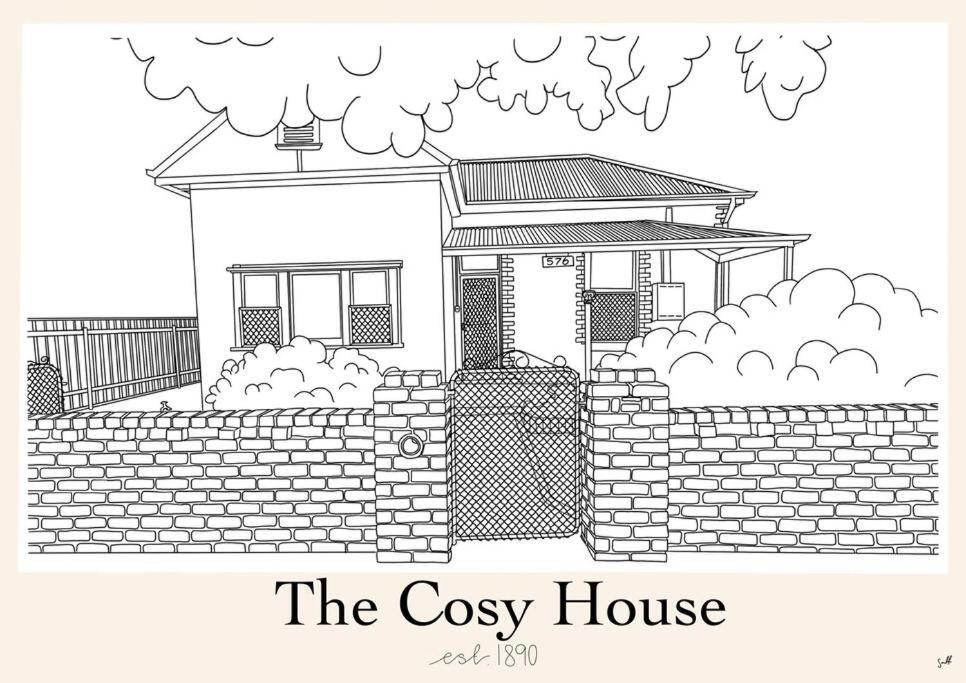a black and white drawing of a house behind a brick fence at The Cosy House - Central Albury in Albury