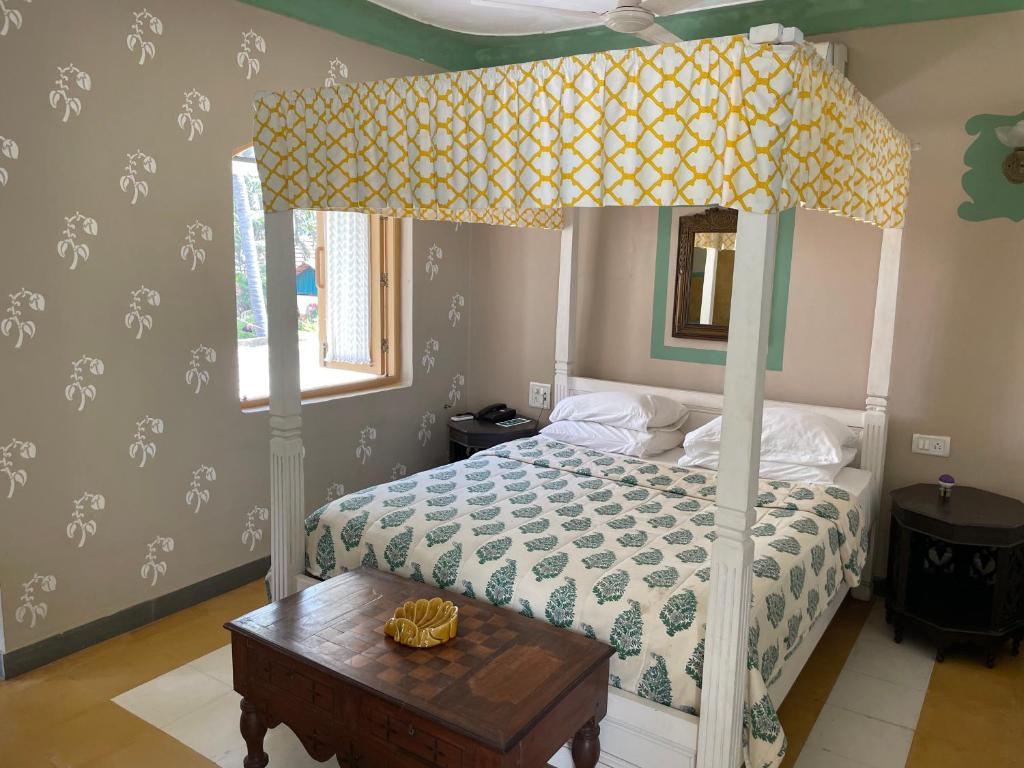 Кровать или кровати в номере Casa Anjuna
