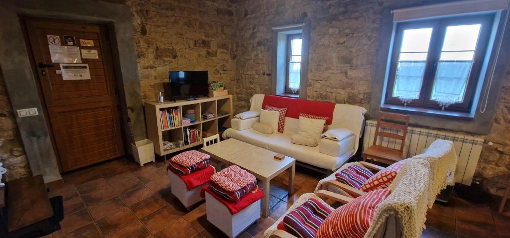 TV a/nebo společenská místnost v ubytování Apartamentos Casa Bárbora - AR-720-AS