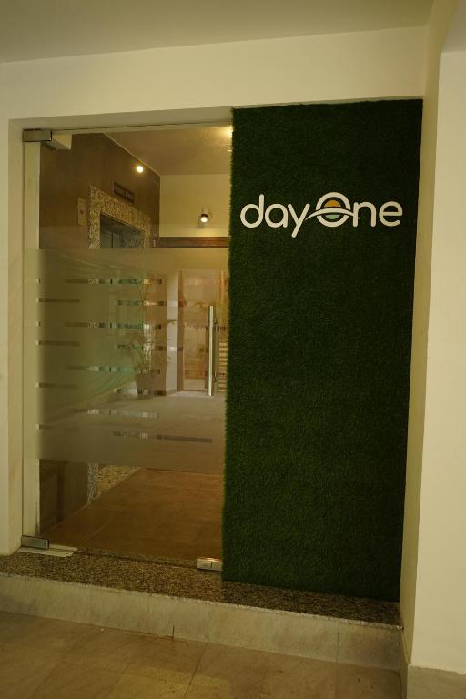 a shop window with the day one sign on it at DayOne Suites Kuvempu in Bangalore