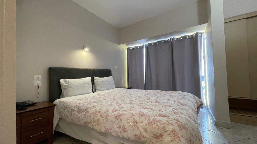 Postel nebo postele na pokoji v ubytování Hotel Atlanta