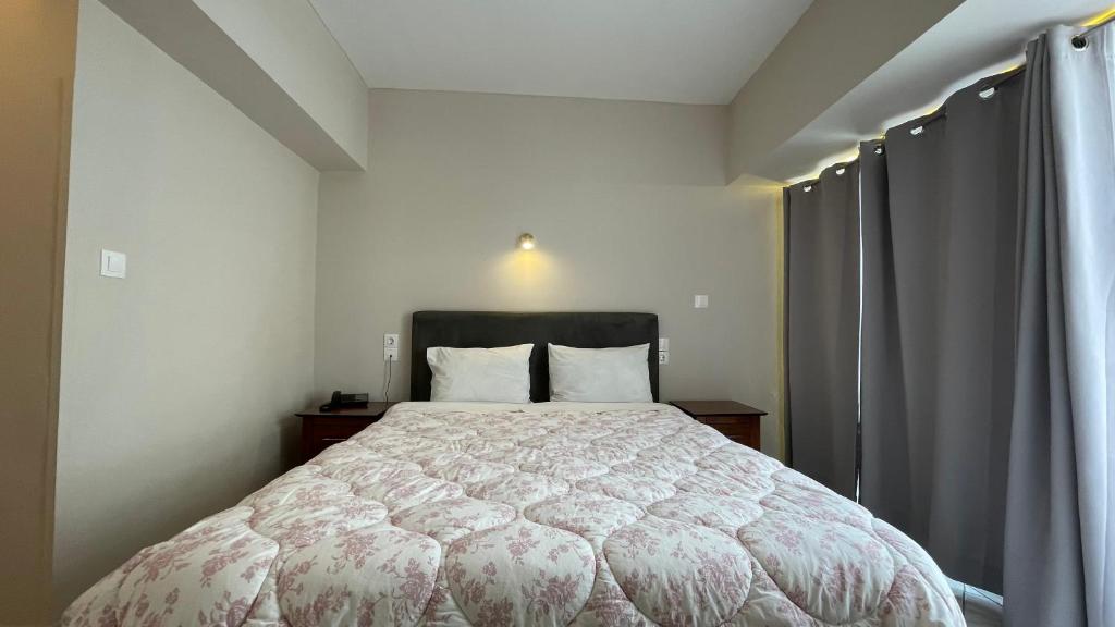 Postel nebo postele na pokoji v ubytování Hotel Atlanta