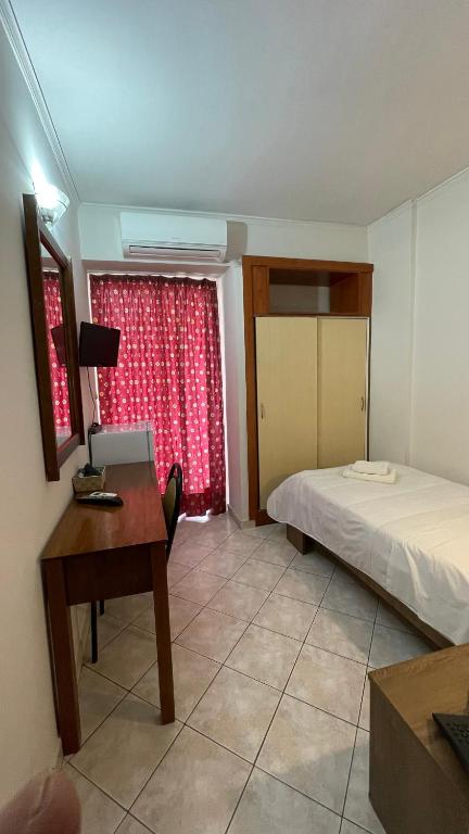 Postel nebo postele na pokoji v ubytování Hotel Atlanta