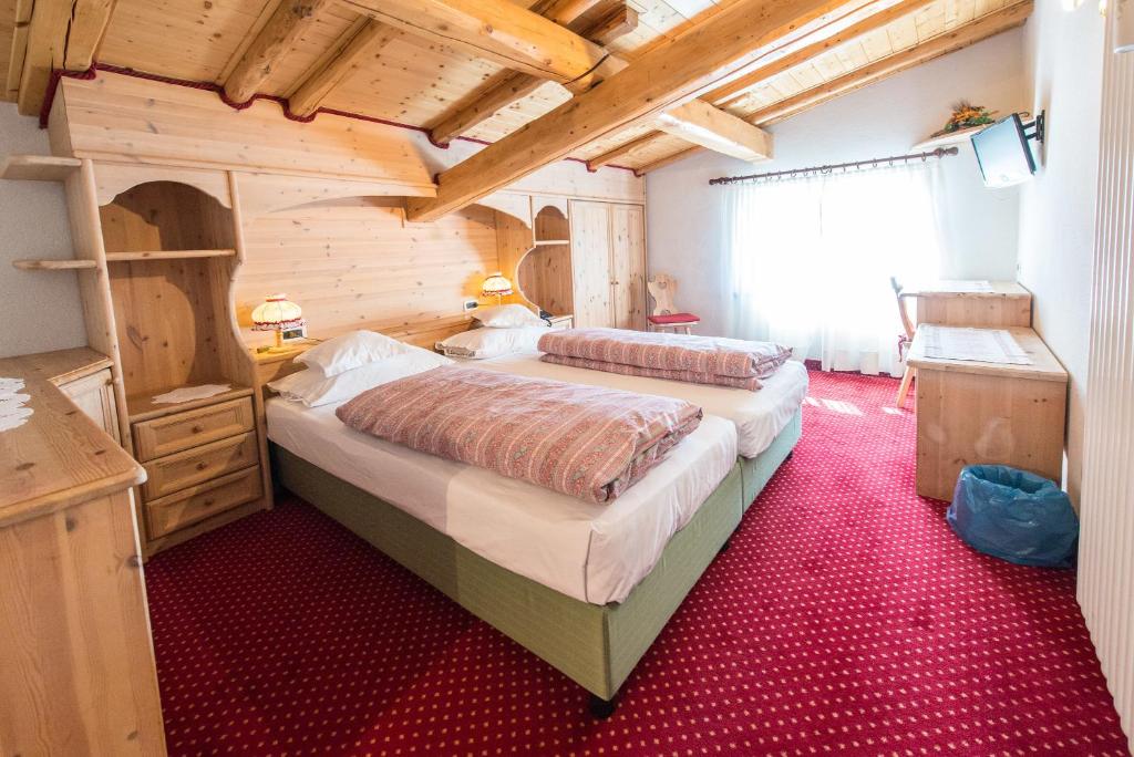 Voodi või voodid majutusasutuse HOTEL GARNi NORMA toas