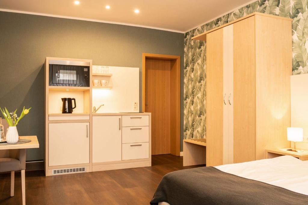 Postel nebo postele na pokoji v ubytování Hotel Pieper-Kersten