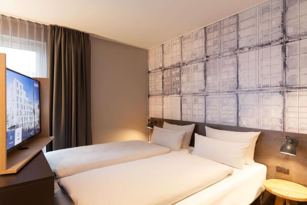 Vienna House Easy by Wyndham Bremen City Apartments - Resim 19