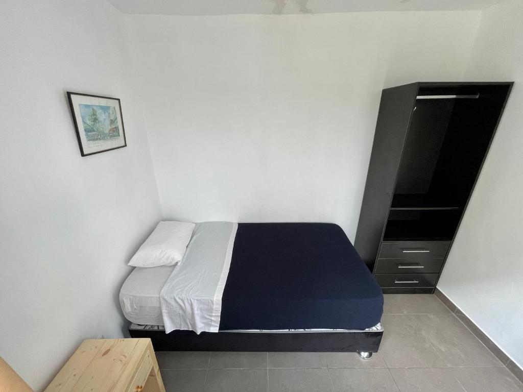 Postel nebo postele na pokoji v ubytování Casaroma Hostels