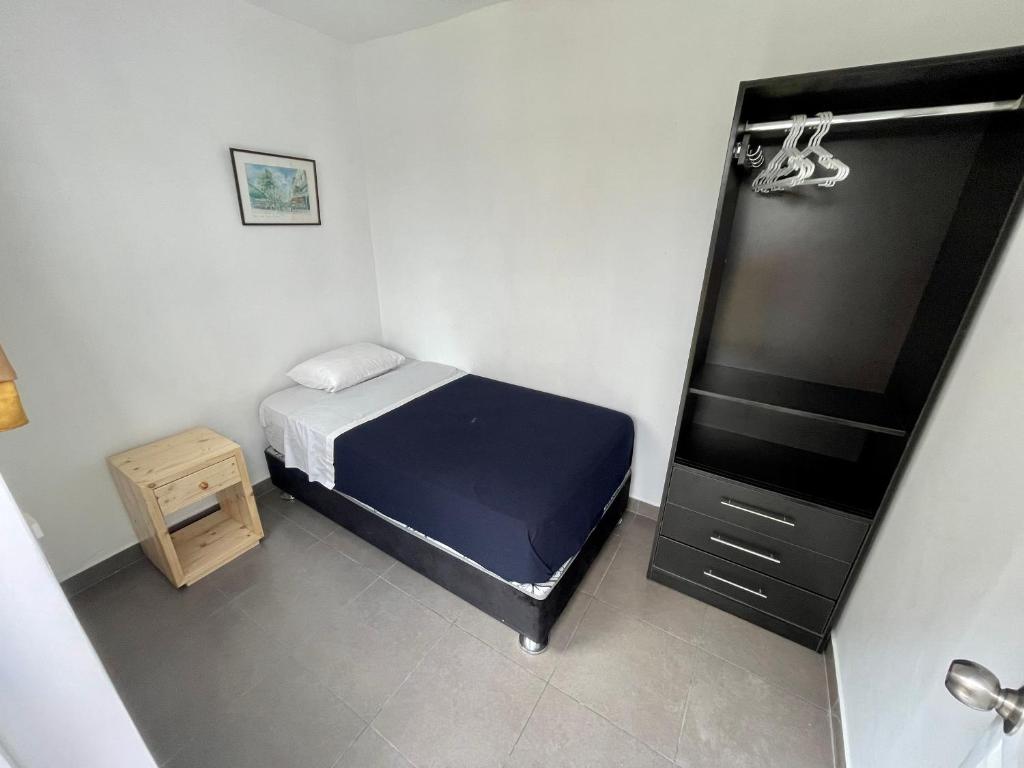 Postel nebo postele na pokoji v ubytování Casaroma Hostels