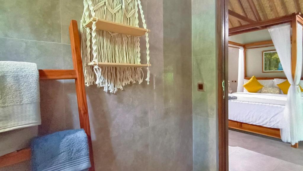 Postel nebo postele na pokoji v ubytování Dalai Tropical