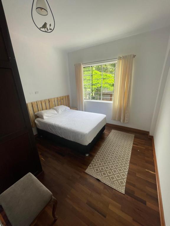 Postel nebo postele na pokoji v ubytování Casaroma Hostels