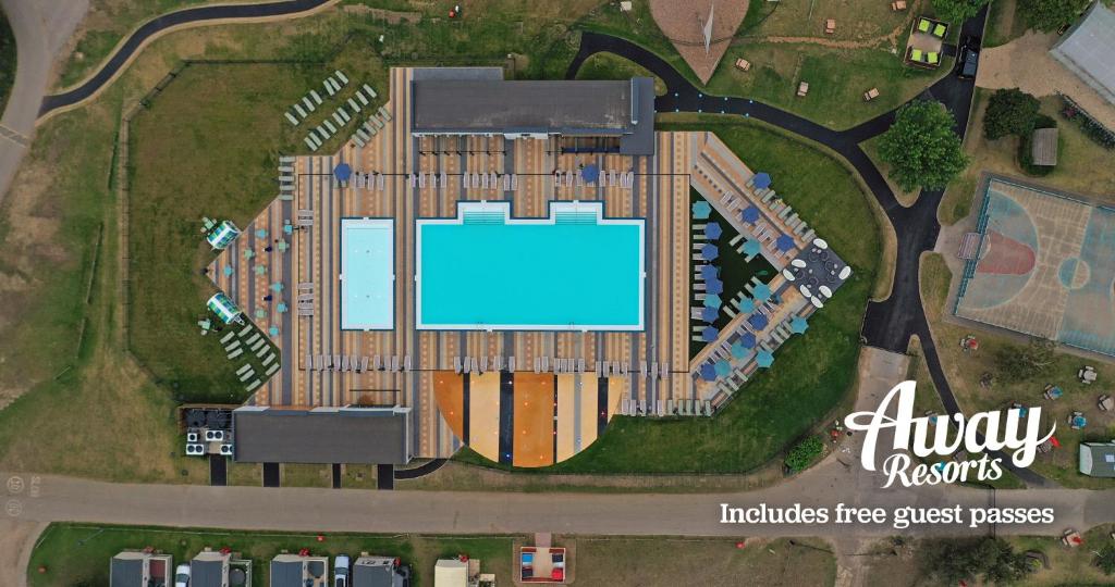 an overhead view of a building with a pool at Tattershall Lakes Country Park in Tattershall