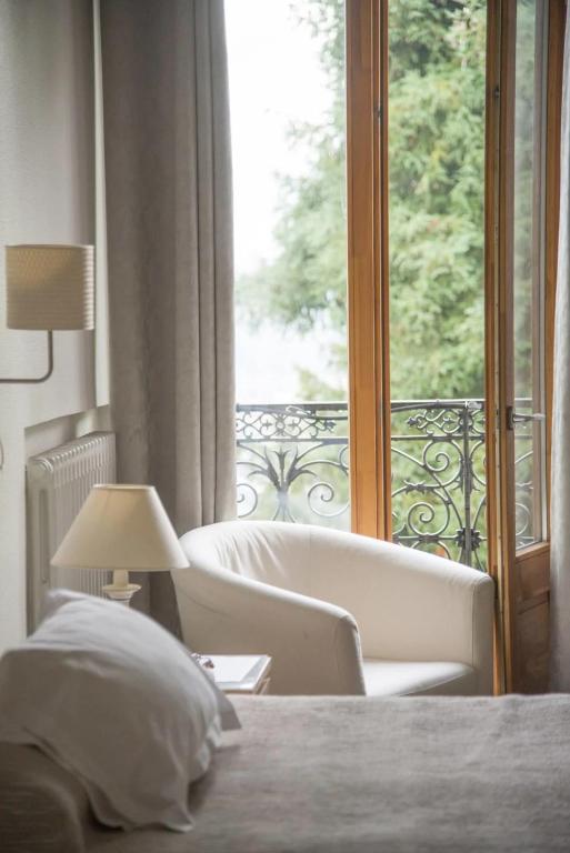 Posteľ alebo postele v izbe v ubytovaní Hôtel Gallia