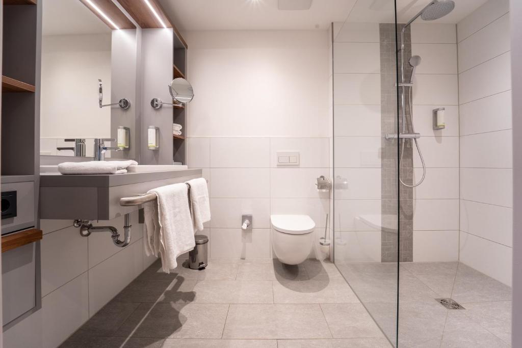 Koupelna v ubytování Hotel INCLUDiO