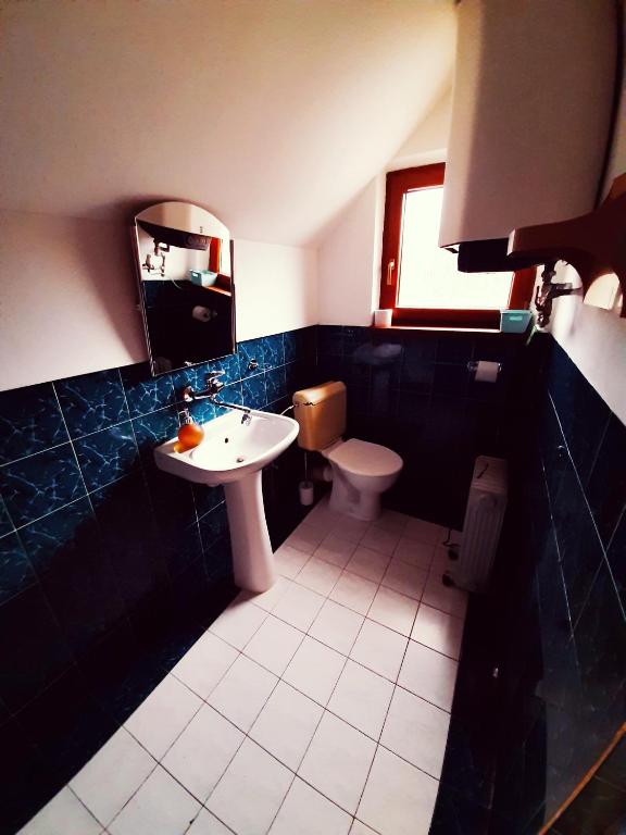Koupelna v ubytování Apartmány Goral Oravice