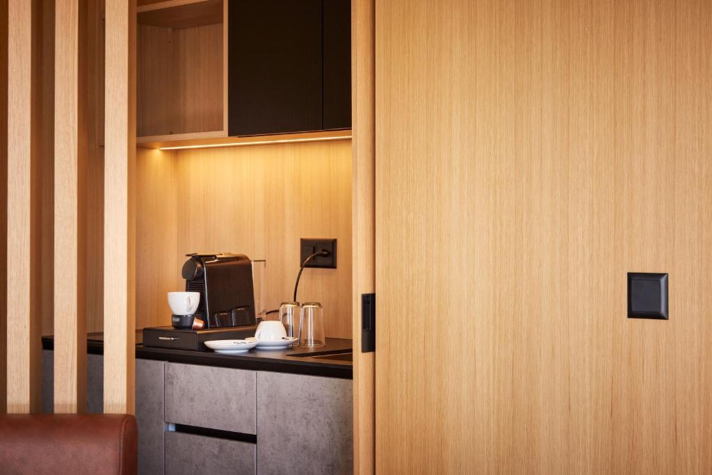 Kuchyň nebo kuchyňský kout v ubytování Tailormade Hotel RIGIBLICK Küssnacht