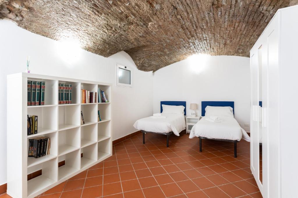A bed or beds in a room at HouSmart Miramonte 3