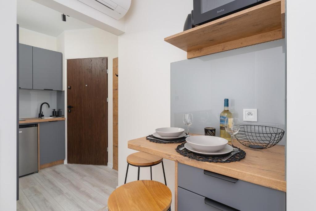 Kuchyňa alebo kuchynka v ubytovaní Modern Studio Cracow Rakowicka 14 by Noclegi Renters