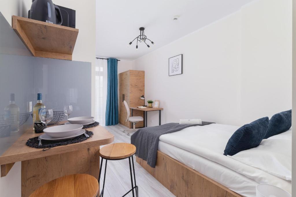 Posteľ alebo postele v izbe v ubytovaní Modern Studio Cracow Rakowicka 14 by Noclegi Renters
