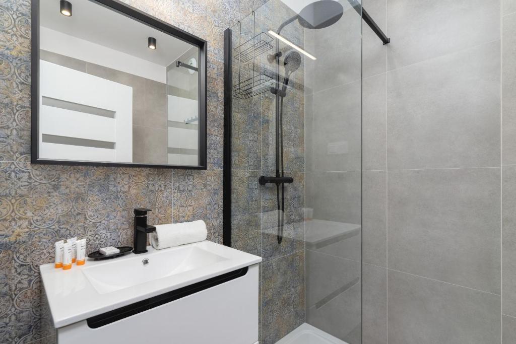 Kúpeľňa v ubytovaní Modern Studio Cracow Rakowicka 14 by Noclegi Renters