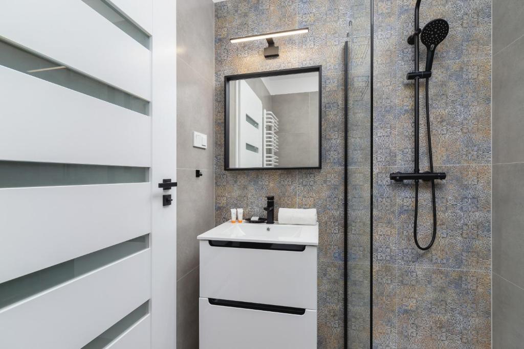 Kúpeľňa v ubytovaní Modern Studio Cracow Rakowicka 14 by Noclegi Renters