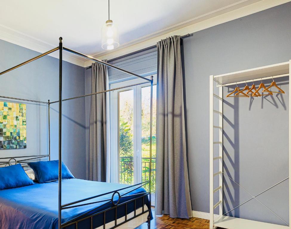 A bed or beds in a room at Villa Caramino