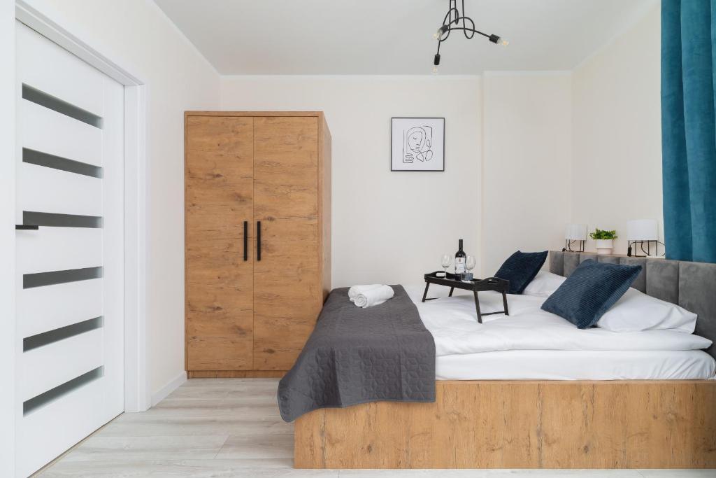 Posteľ alebo postele v izbe v ubytovaní Modern Studio Cracow Rakowicka 14 by Noclegi Renters